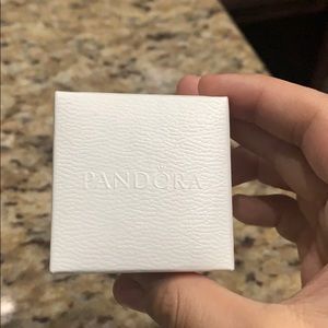 A rose gold pandora ring